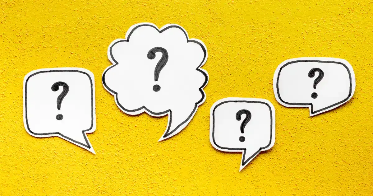 cartoonish question marks on yellow background