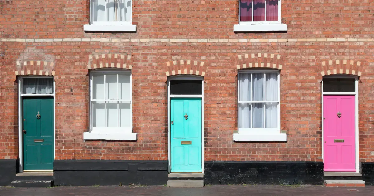 UK home georgian style with colourful front doors