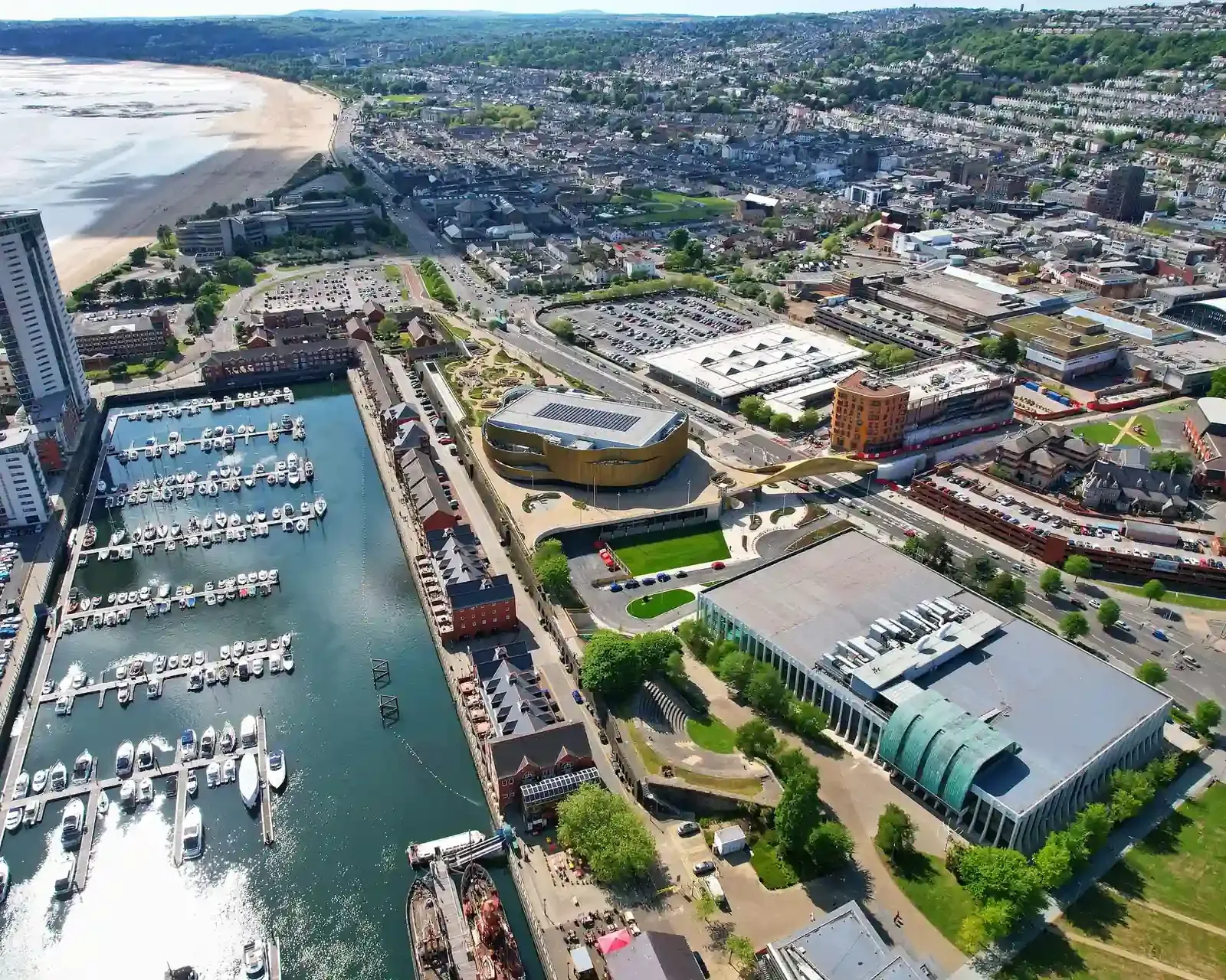 Swansea Marina with Meridian Tower and the city's National Waterfront Museum, home to our conveyancing solicitors