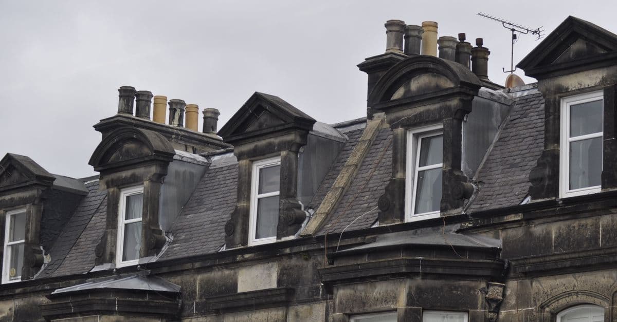 Classic Edinburgh architecture featuring historic dormer windows and slate roofs.