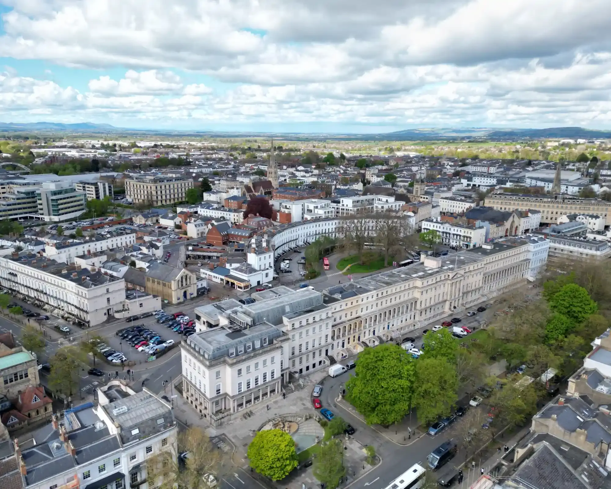 Aerial view of Cheltenham’s Regency town centre, with the Royal Crescent and the Municipal Offices on the Promenade.