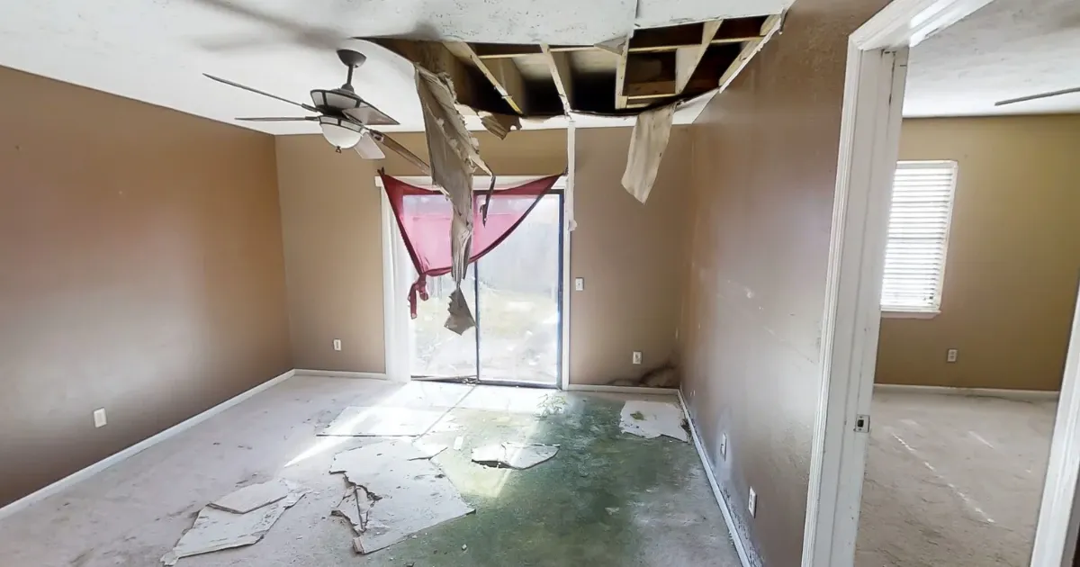 A room with the ceiling falling down